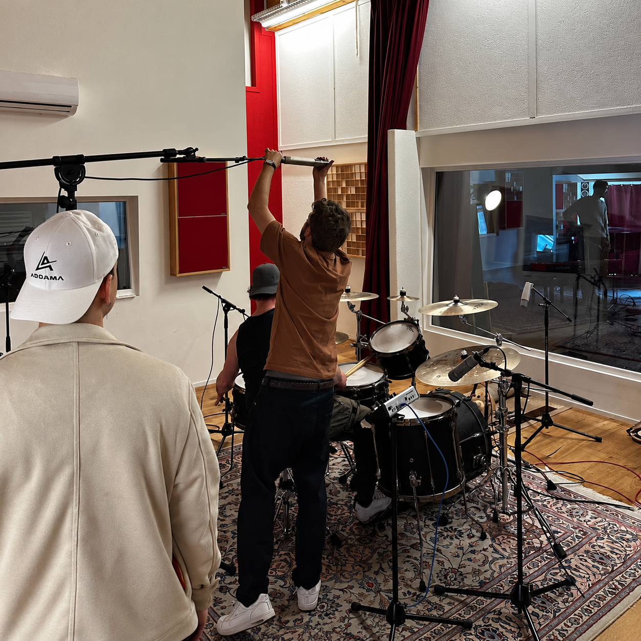 Recording session with microphones and drums in the studio